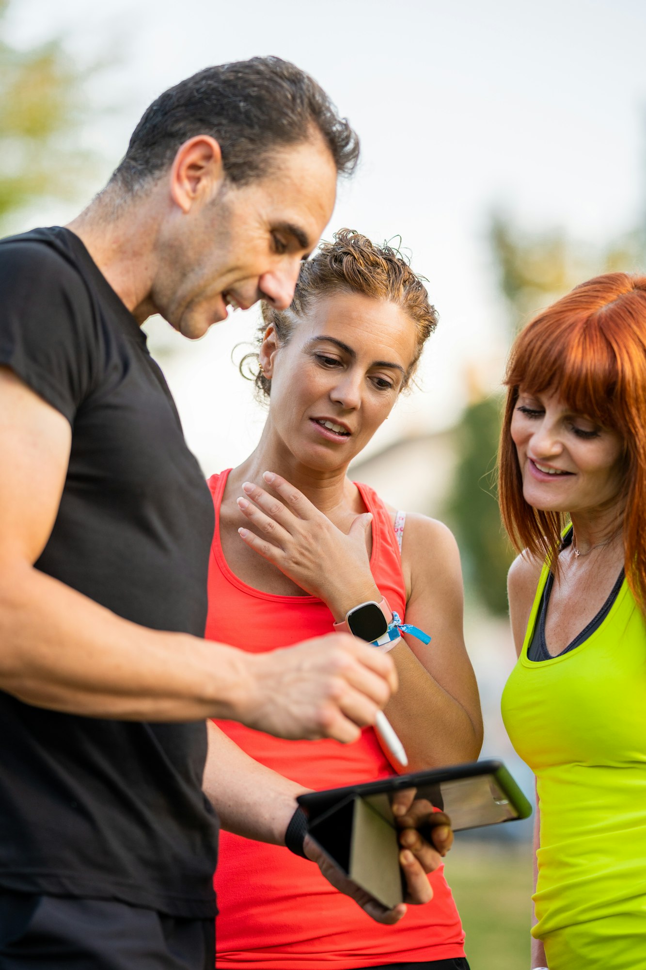 Personal Trainer Talking with Women
